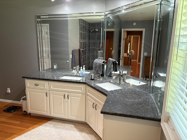 4849 W Rose Hill Rd, Billings, MO 65610 - full bathroom featuring double vanity and a tile shower
