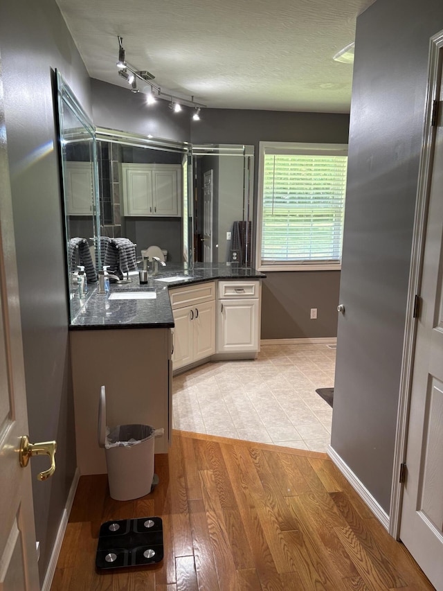 4849 W Rose Hill Rd, Billings, MO 65610 - bathroom featuring vanity and wood finished floors