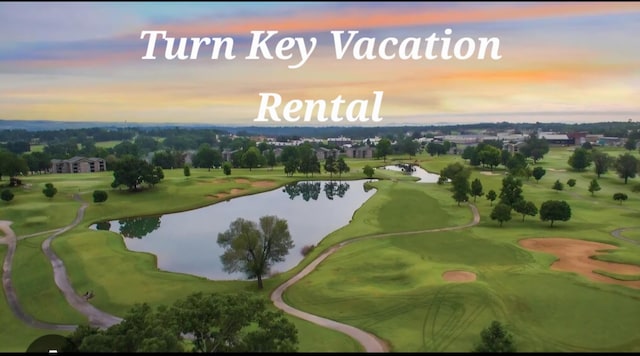 835 Fairview St Unit 3, Branson, MO 65616 - aerial view at dusk of a water view and view of golf course