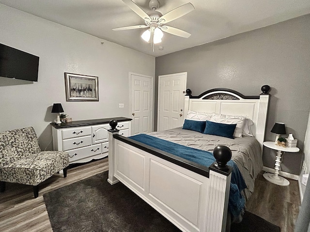 835 Fairview St Unit 3, Branson, MO 65616 - bedroom with dark wood finished floors and ceiling fan