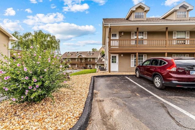 1 Memory Ln Unit 1, Branson, MO 65616 - view of front of property with uncovered parking and roof with shingles