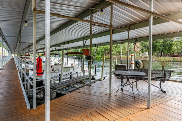 1 Memory Ln Unit 1, Branson, MO 65616 - dock area featuring boat lift and a water view
