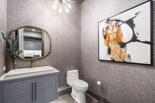 355 Catalina Dr, Branson, MO 65616 - half bath featuring vanity, a chandelier, and tile patterned flooring
