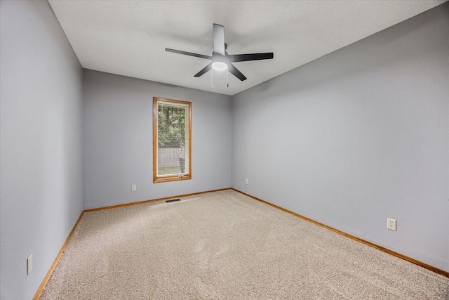 951 S Alex Ave, Springfield, MO 65802 - carpeted spare room featuring a ceiling fan and baseboards