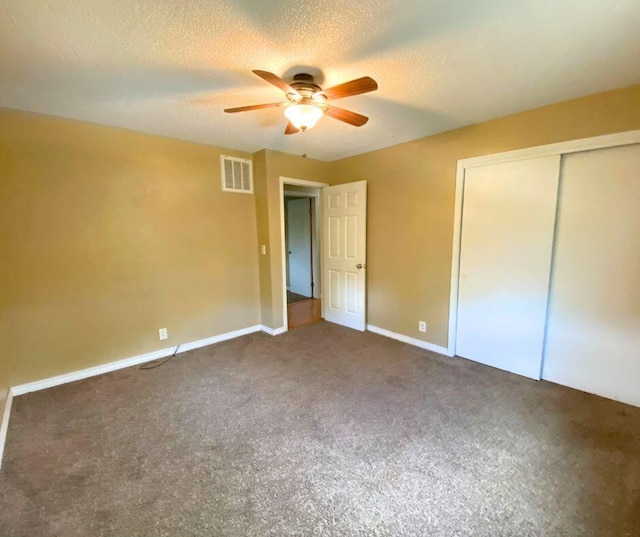 106 Cooley Dr, Carl Junction, MO 64834 - unfurnished bedroom with a textured ceiling, a closet, carpet, and a ceiling fan