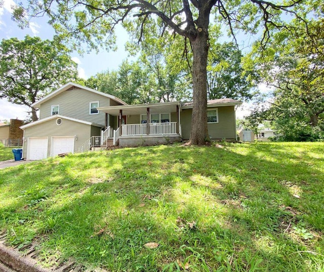 106 Cooley Dr, Carl Junction, MO 64834 - view of front of property featuring a porch, an attached garage, and a front yard
