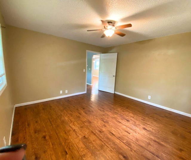 106 Cooley Dr, Carl Junction, MO 64834 - unfurnished room with a ceiling fan, wood finished floors, and a textured ceiling
