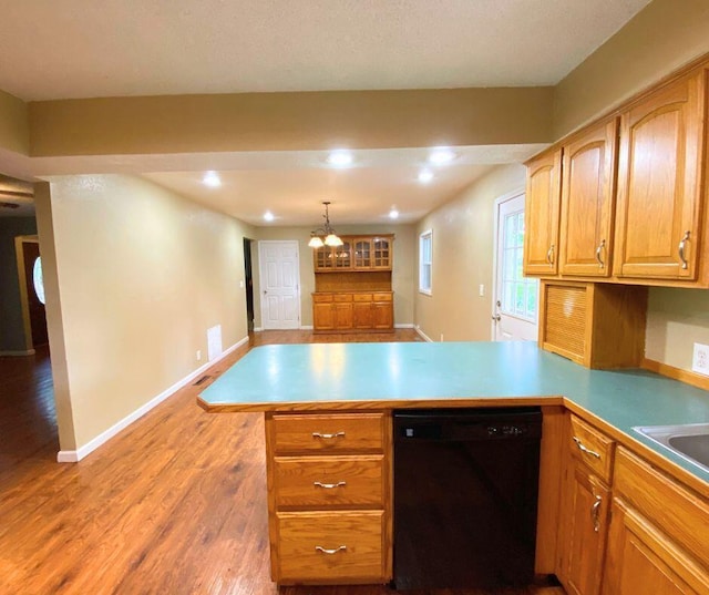 106 Cooley Dr, Carl Junction, MO 64834 - kitchen with black dishwasher, a peninsula, a chandelier, light wood-type flooring, and recessed lighting