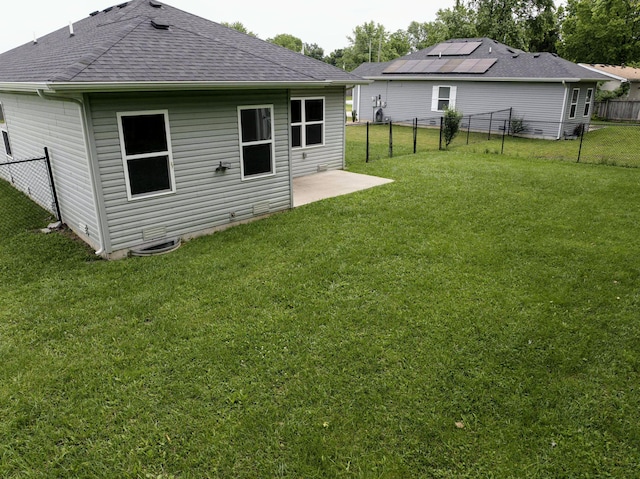 226 W Mount Vernon Rd, Billings, MO 65610 - rear view of property with a shingled roof and a fenced backyard