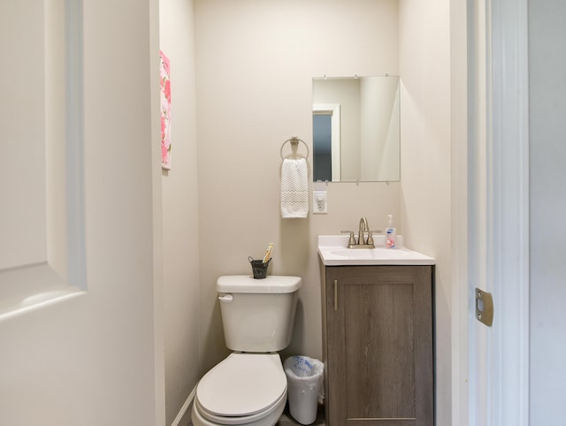2823 E Catalpa St, Springfield, MO 65804 - half bathroom featuring vanity and toilet