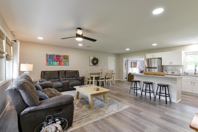 2823 E Catalpa St, Springfield, MO 65804 - living room with recessed lighting, wood finished floors, and ceiling fan