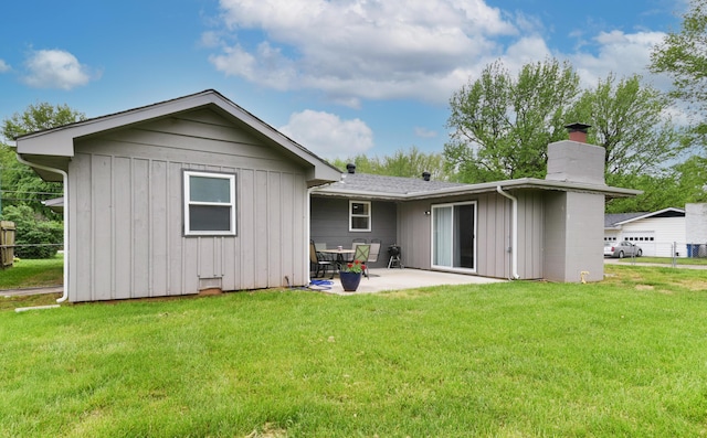 2823 E Catalpa St, Springfield, MO 65804 - back of house featuring a chimney and a patio area