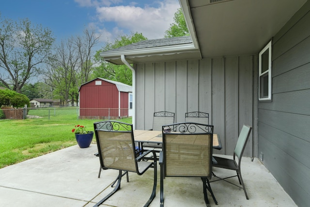 2823 E Catalpa St, Springfield, MO 65804 - view of patio / terrace with outdoor dining area and a storage shed