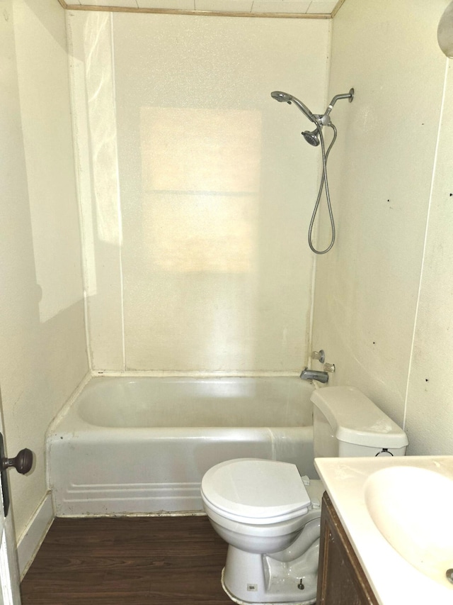 306 S Locust St, Buffalo, MO 65622 - bathroom with wood finished floors, vanity, and shower / bathtub combination