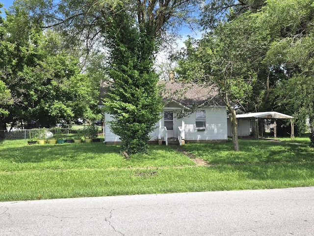 306 S Locust St, Buffalo, MO 65622 - view of front of home featuring a carport