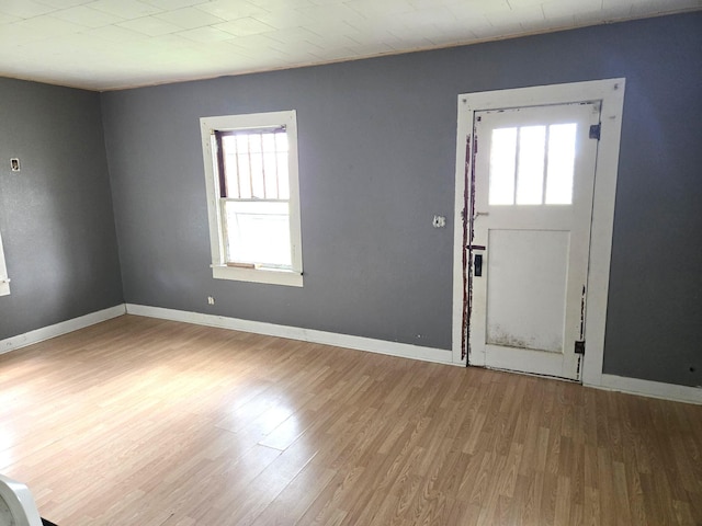 306 S Locust St, Buffalo, MO 65622 - entryway featuring healthy amount of natural light and wood finished floors