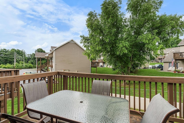 540 Abby Ln Unit 6, Branson, MO 65616 - deck featuring outdoor dining space, a yard, and a residential view
