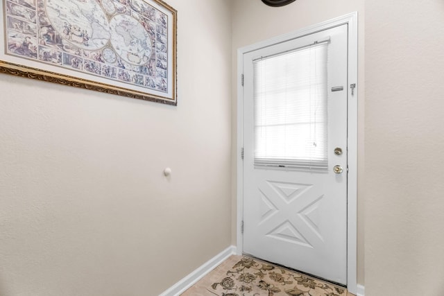 540 Abby Ln Unit 6, Branson, MO 65616 - doorway to outside featuring baseboards and light tile patterned flooring