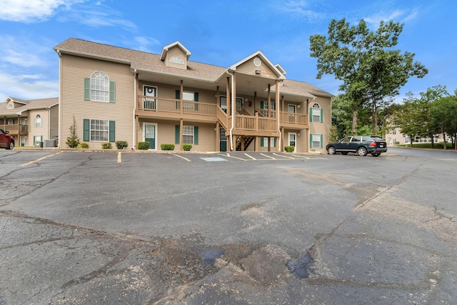 540 Abby Ln Unit 6, Branson, MO 65616 - view of building exterior featuring uncovered parking and stairway