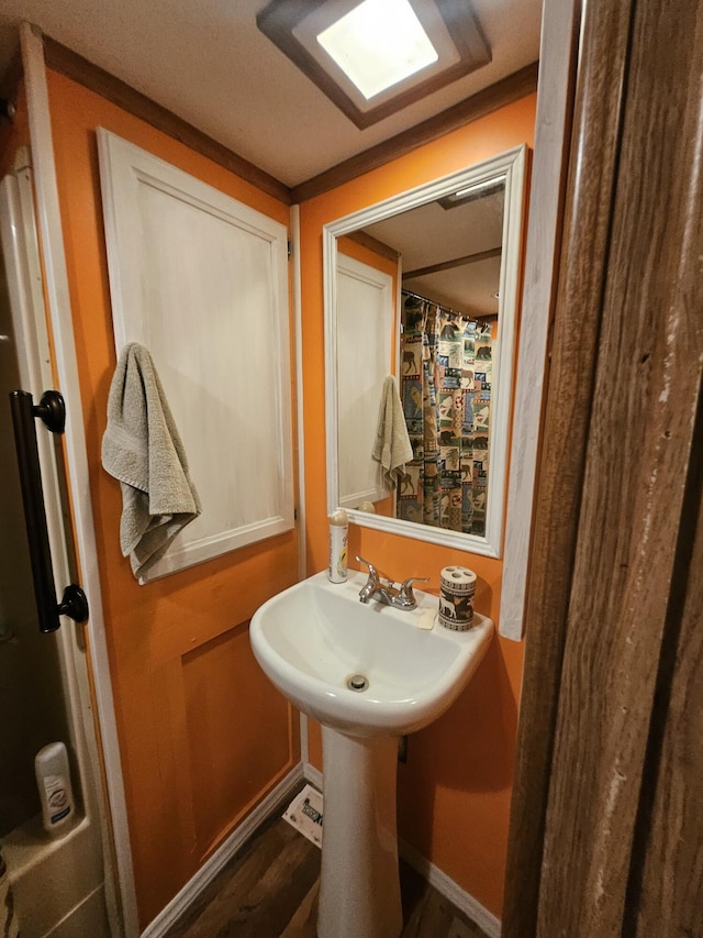 462 Jellystone Ave, Hollister, MO 65672 - bathroom featuring wood finished floors and baseboards