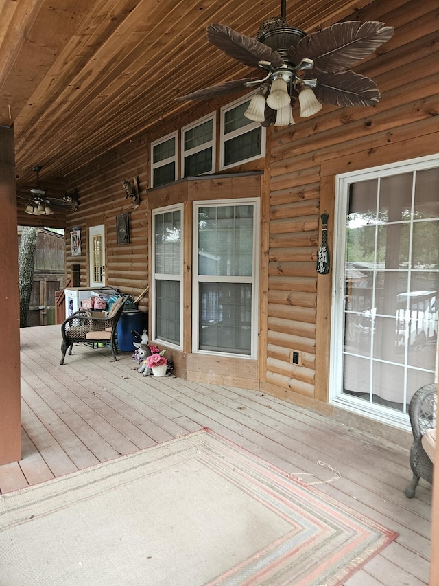 462 Jellystone Ave, Hollister, MO 65672 - porch featuring a ceiling fan