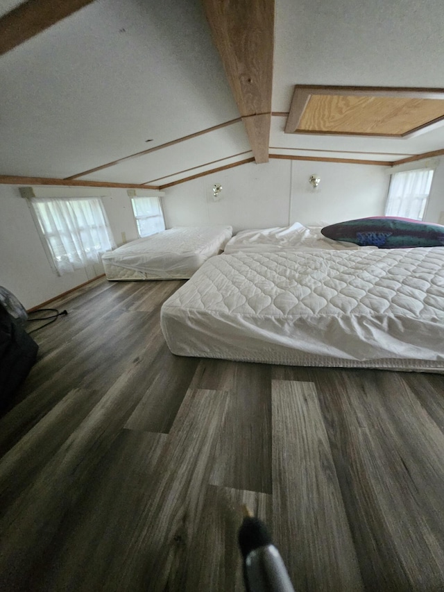 462 Jellystone Ave, Hollister, MO 65672 - bedroom featuring wood finished floors and beamed ceiling