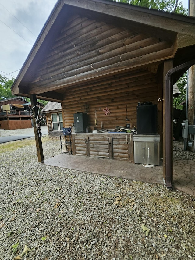 462 Jellystone Ave, Hollister, MO 65672 - view of patio with area for grilling