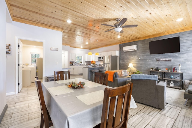 19899 E 1820th Rd, Fair Play, MO 65649 - dining space with wooden ceiling, wooden walls, an accent wall, a ceiling fan, and recessed lighting
