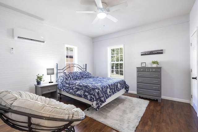 19899 E 1820th Rd, Fair Play, MO 65649 - bedroom with a wall mounted air conditioner, dark wood-type flooring, and a ceiling fan