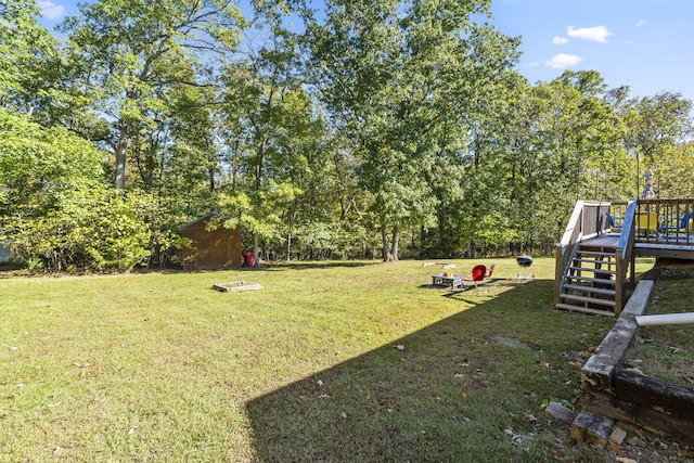 19899 E 1820th Rd, Fair Play, MO 65649 - view of green lawn with a wooden deck and stairs