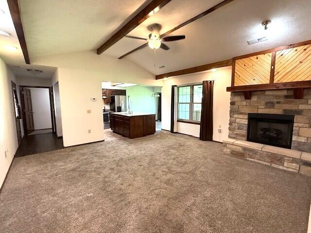 2604 Country Dr, Mountain Grove, MO 65711 - unfurnished living room with ceiling fan, a fireplace, and carpet