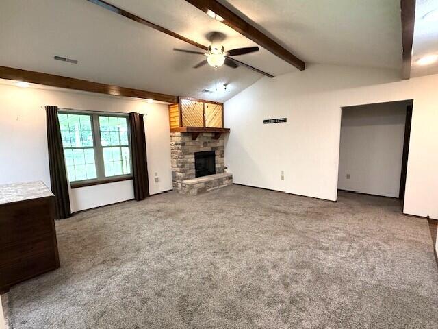 2604 Country Dr, Mountain Grove, MO 65711 - unfurnished living room with ceiling fan, a fireplace, and carpet flooring
