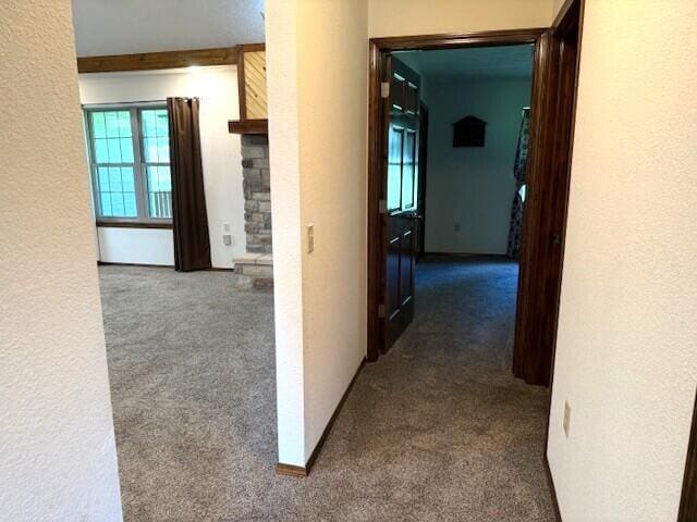 2604 Country Dr, Mountain Grove, MO 65711 - corridor featuring carpet floors and a textured wall