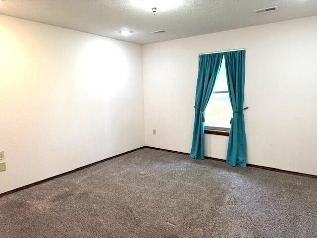 2604 Country Dr, Mountain Grove, MO 65711 - carpeted empty room with baseboards