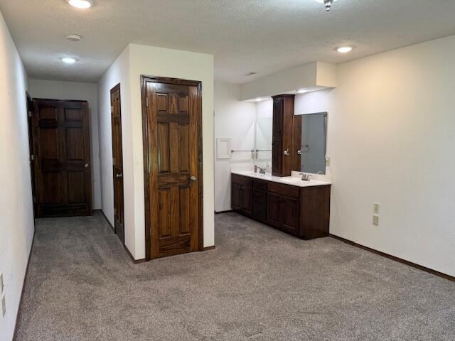 2604 Country Dr, Mountain Grove, MO 65711 - corridor featuring light carpet and baseboards