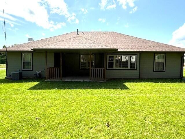 2604 Country Dr, Mountain Grove, MO 65711 - back of house featuring a lawn and a shingled roof