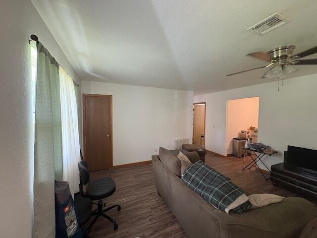 117 E Springfield St, Aurora, MO 65605 - living room featuring wood finished floors and a ceiling fan