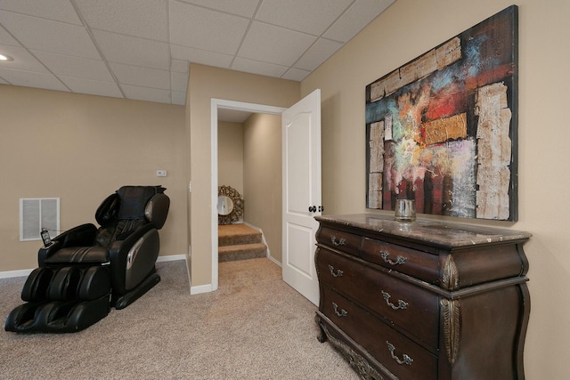 3223 W Melbourne St, Springfield, MO 65810 - living area featuring light carpet, a drop ceiling, and stairs