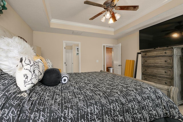 3223 W Melbourne St, Springfield, MO 65810 - bedroom featuring a tray ceiling, crown molding, and ceiling fan