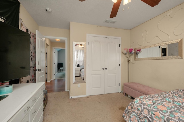 3223 W Melbourne St, Springfield, MO 65810 - bedroom featuring a closet, light colored carpet, and a ceiling fan