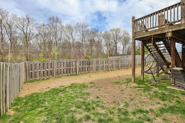 3223 W Melbourne St, Springfield, MO 65810 - fenced backyard featuring stairs and a wooden deck