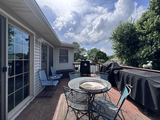 3517 Hackberry Ln, Joplin, MO 64801 - wooden deck featuring outdoor dining area