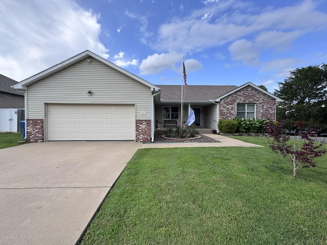 3517 Hackberry Ln, Joplin, MO 64801 - ranch-style house featuring brick siding, driveway, a garage, a front yard, and a shingled roof