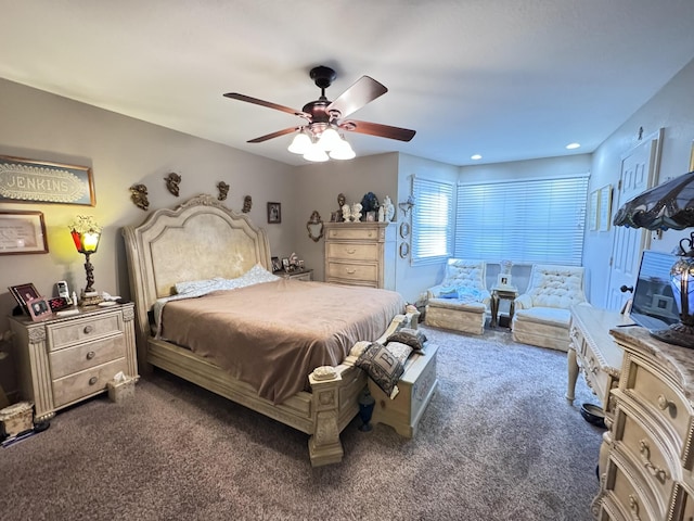 3517 Hackberry Ln, Joplin, MO 64801 - bedroom with dark colored carpet and a ceiling fan