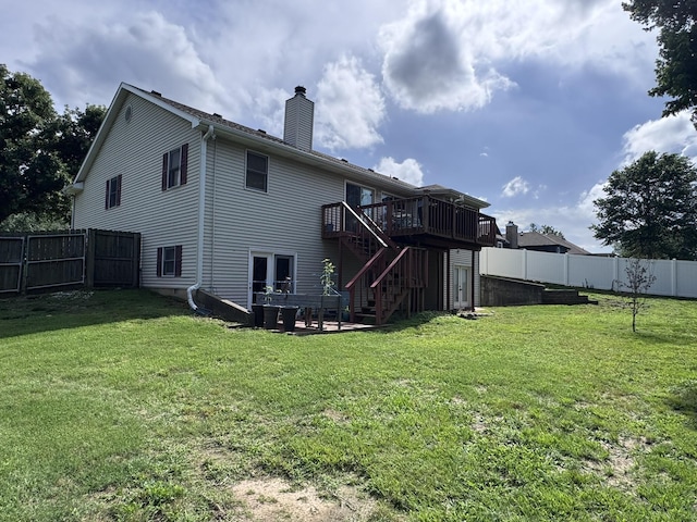 3517 Hackberry Ln, Joplin, MO 64801 - rear view of house with a deck, stairs, a fenced backyard, and a chimney