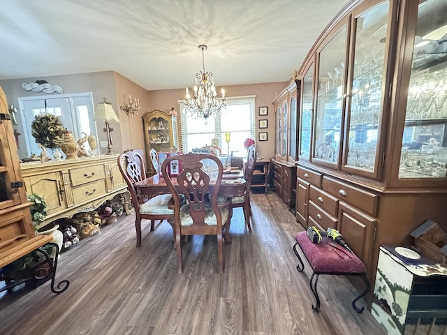 3517 Hackberry Ln, Joplin, MO 64801 - dining space with a chandelier and dark wood-style floors