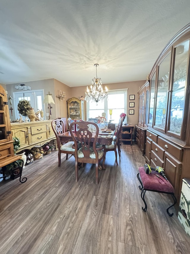3517 Hackberry Ln, Joplin, MO 64801 - dining space featuring a chandelier and wood finished floors