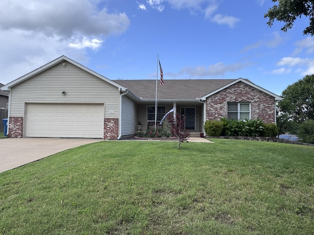3517 Hackberry Ln, Joplin, MO 64801 - ranch-style home featuring brick siding, an attached garage, driveway, and a front yard