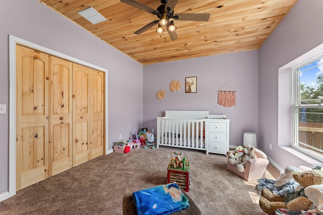 770 Mills Hollow Rd, Branson, MO 65616 - carpeted bedroom with wooden ceiling, a nursery area, and ceiling fan
