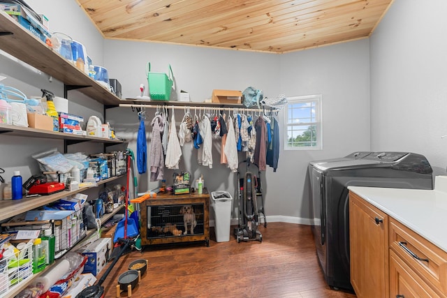 770 Mills Hollow Rd, Branson, MO 65616 - washroom with separate washer and dryer, wood ceiling, wood finished floors, and cabinet space